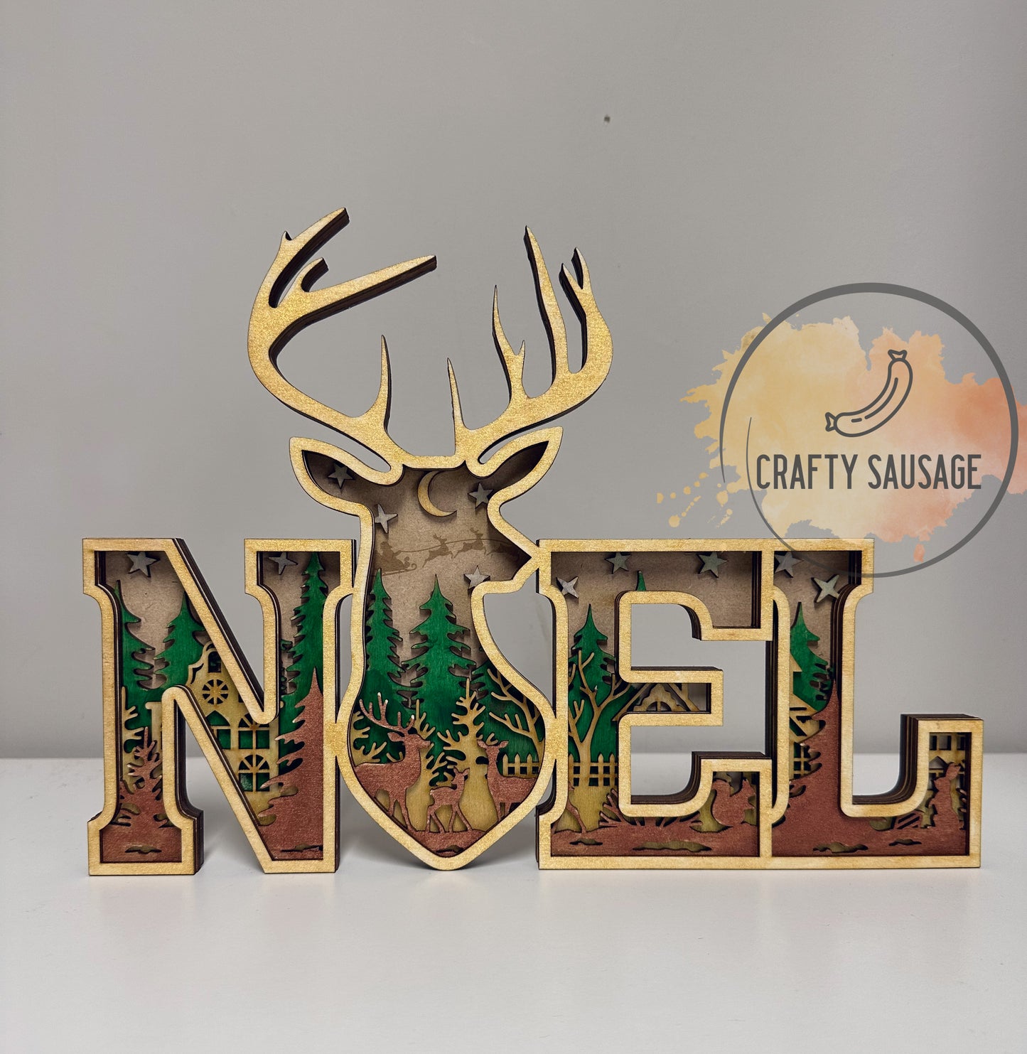 Layered Wooden “NOEL” Sign — 5-Layer Woodland Stag Design